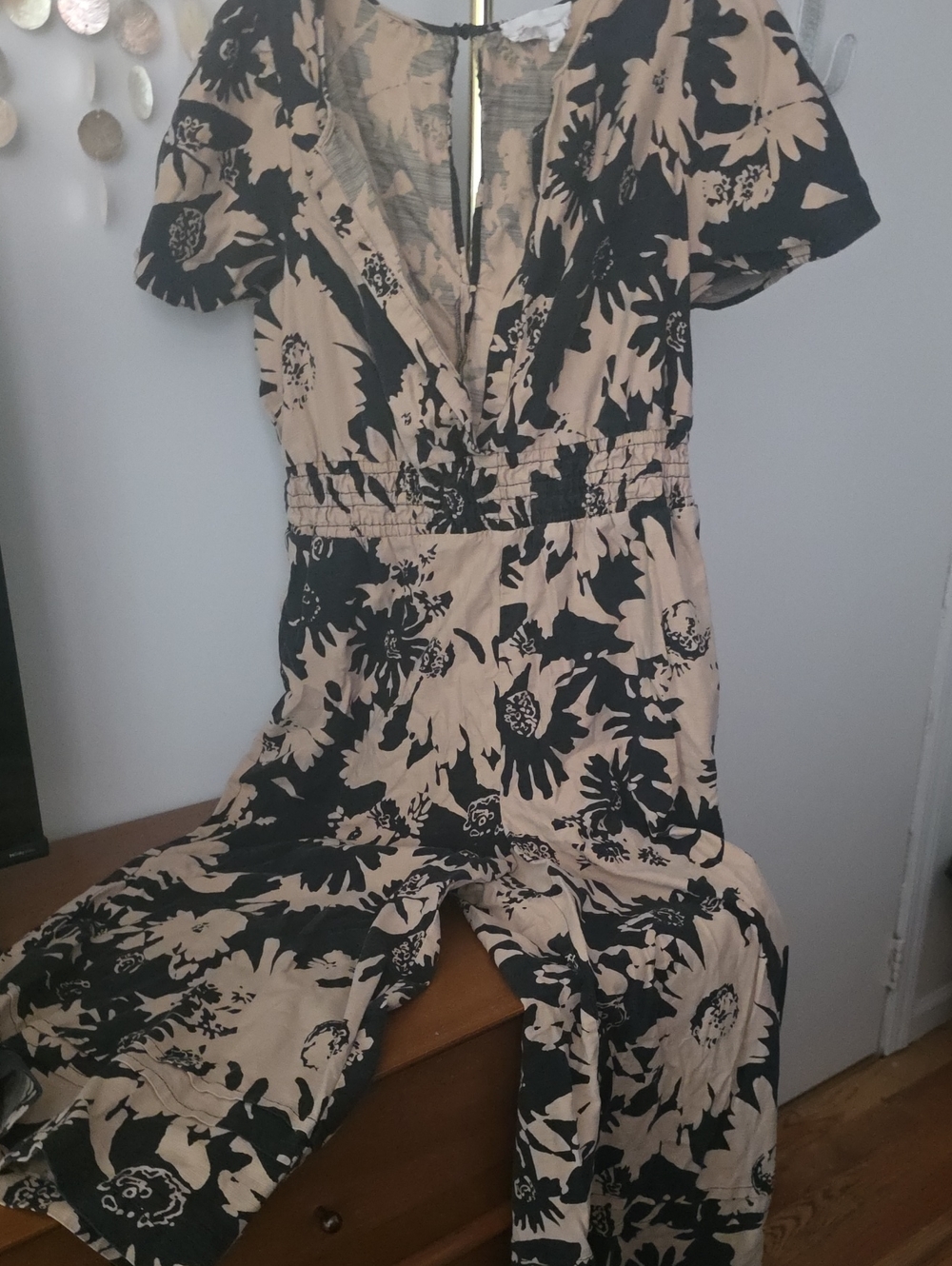 Anthropologie Beige and Black Floral Boot-Cut Jumpsuit